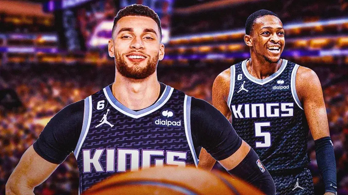 Zach LaVine in a Sacramento Kings jersey next to De'Aaron Fox