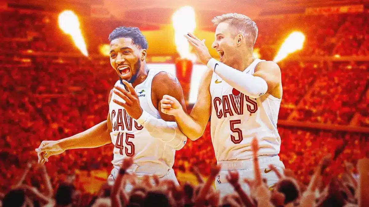 Cleveland Cavaliers' Donovan Mitchell and Sam Merrill in front of Rocket Mortgage Fieldhouse.