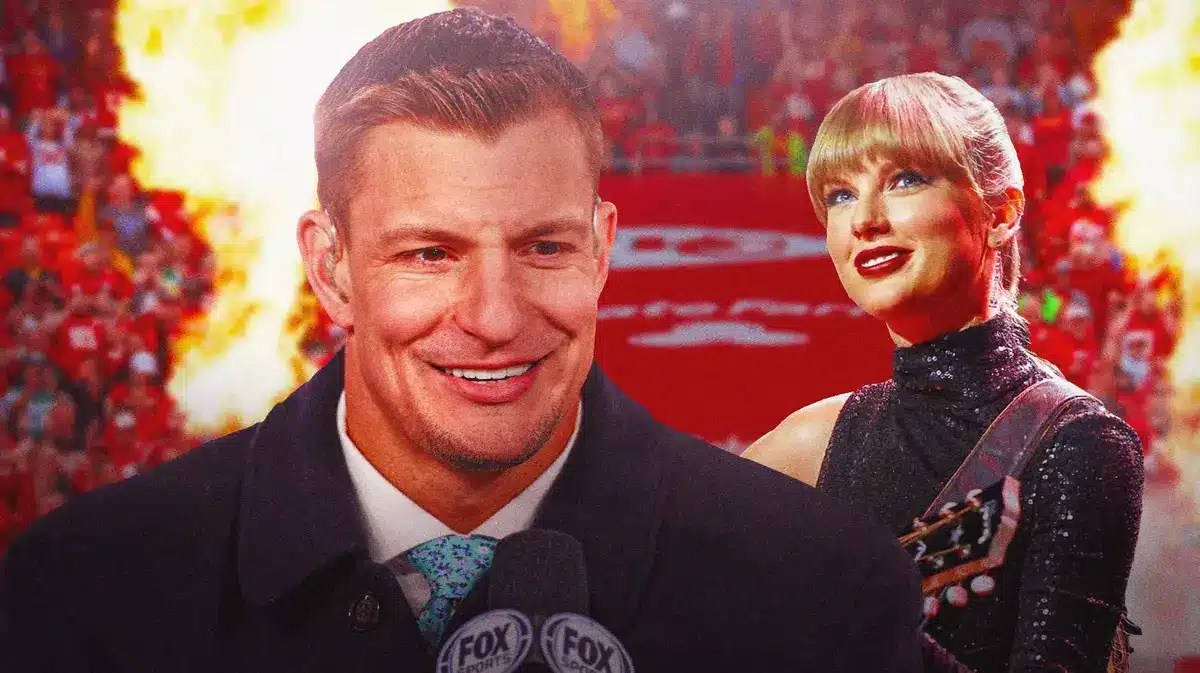 Rob Gronkowski next to Taylor Swift