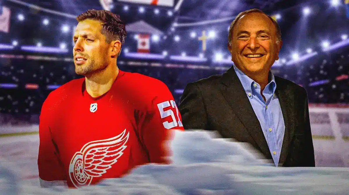Red Wings' David Perron in front looking serious. Gary Bettman in background.
