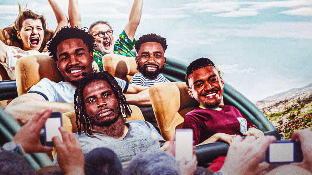 Tyreek Hill, Tua Tagovailoa, Jaylen Waddle, and Raheem Mostert riding a roller coaster