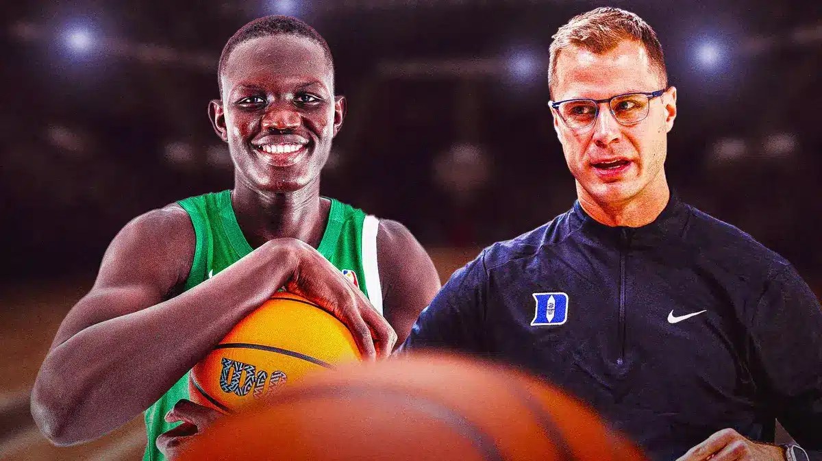 Duke head coach Jon Scheyer with recruit Khaman Maluach