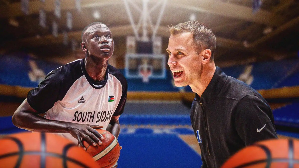 Duke basketball coach Jon Scheyer on the right, and Khaman Maluach on the left.