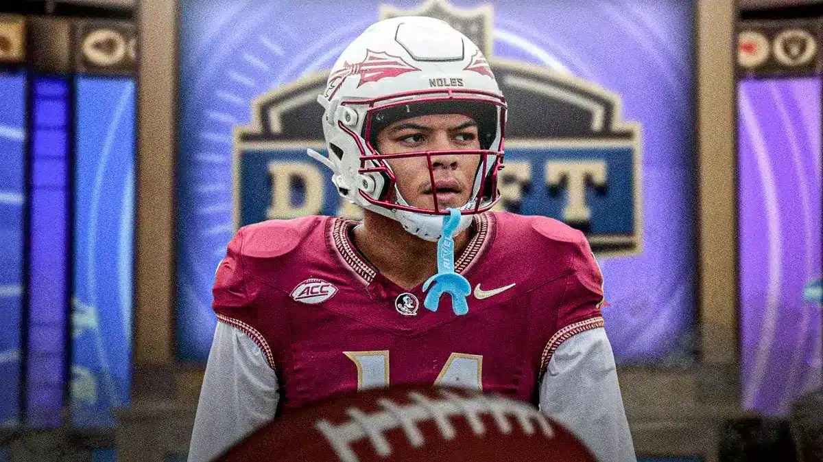 Photo: Johnny Wilson in FSU jersey with NFL draft stage behind him