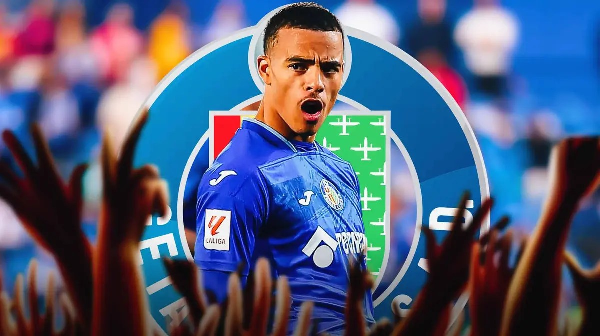 Mason Greenwood celebrating in front of the Getafe logo