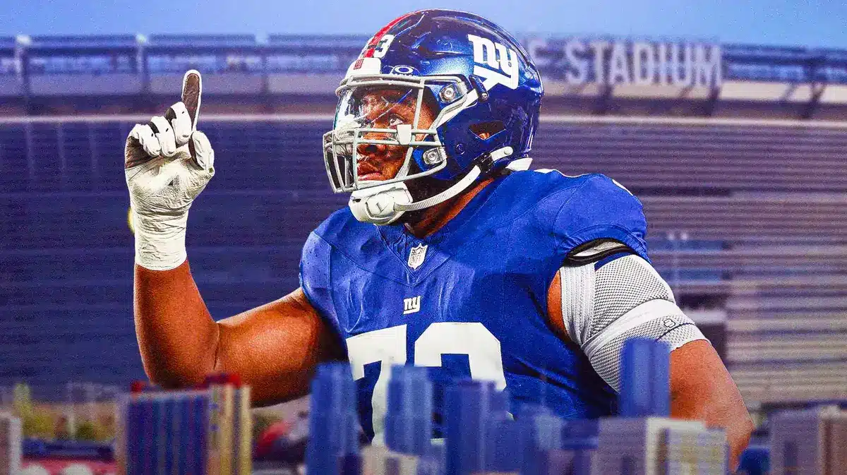 New York Giants star Evan Neal in front of MetLife Stadium.