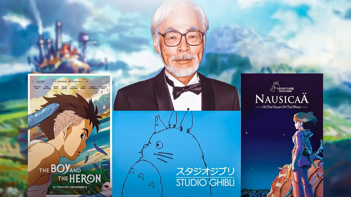 Hayao Miyazaki with posters of The Boy and the Heron and Nausicaä of the Valley of the Wind with Studio Ghibli logo.