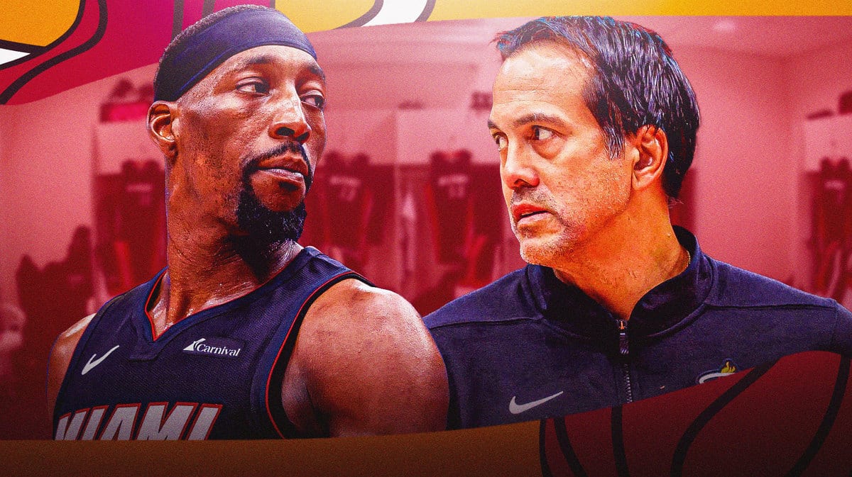 Miami Heat's Bam Adebayo and head coach Erik Spoelstra in front of the team's locker room.