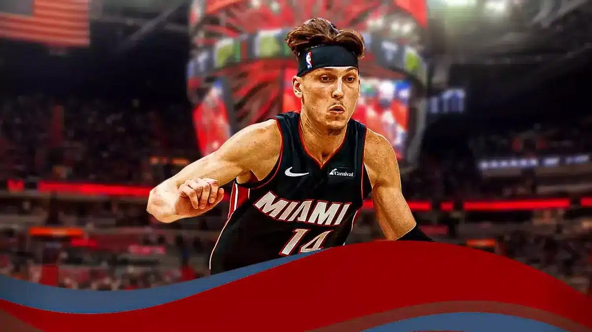 Miami Heat star Tyler Herro in front of the Kaseya Center.