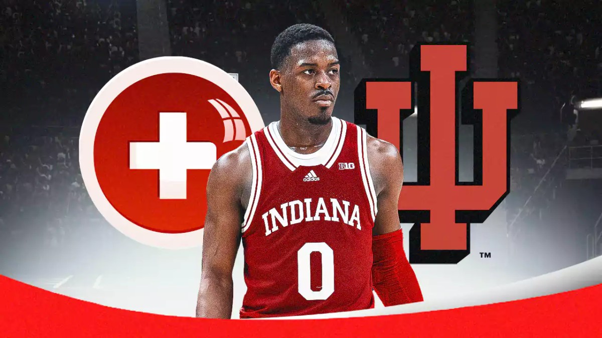 Xavier Johnson with the Indiana Hoosiers logo in the background, also include an injury red cross