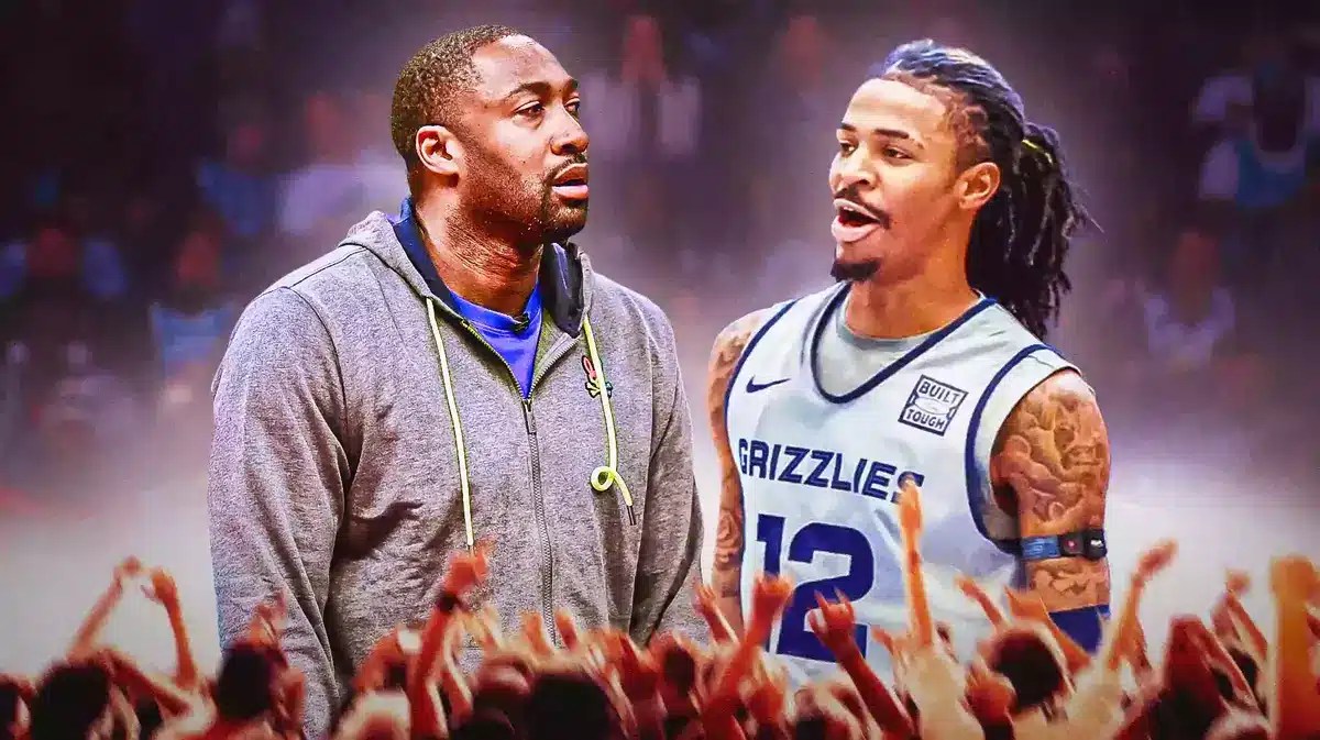 Gilbert Arenas standing next to Memphis Grizzlies star Ja Morant in front of the FedExForum.
