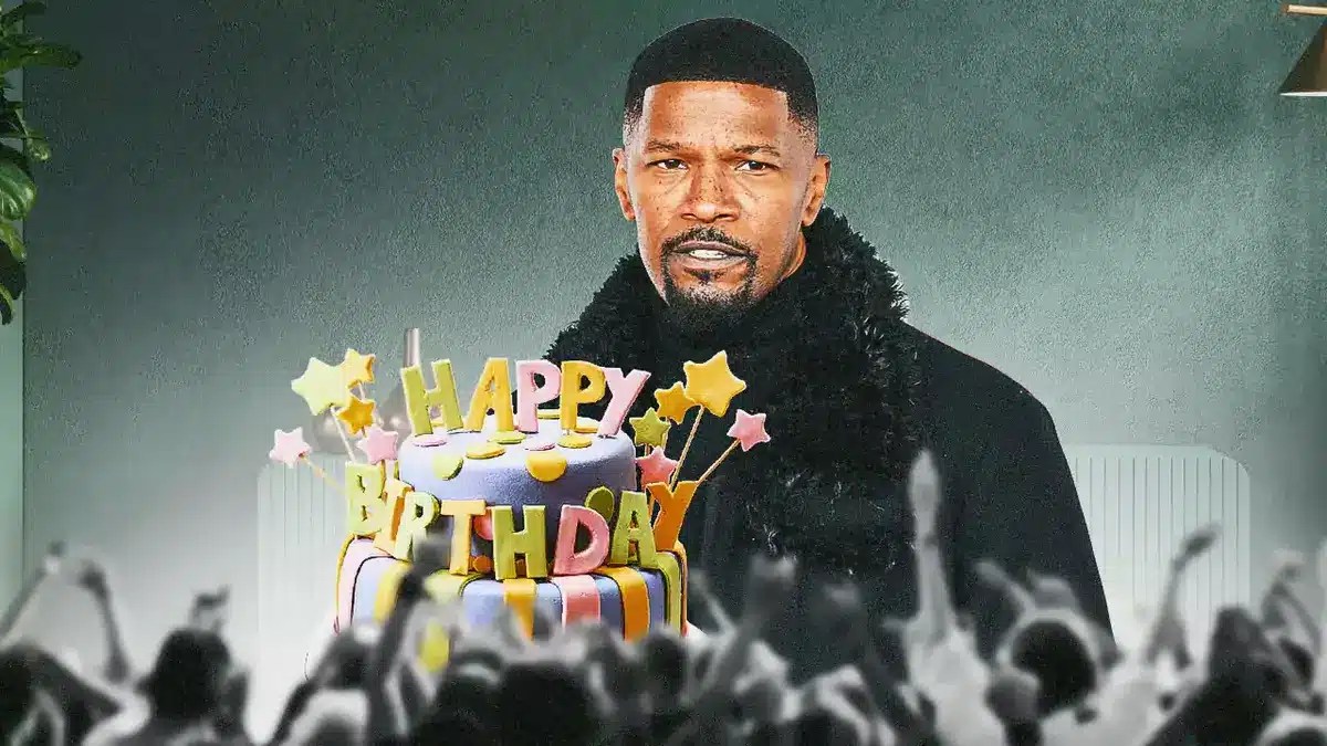 Jamie Foxx with a birthday cake.