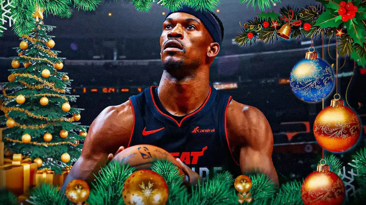 Miami Heat star Jimmy Butler around Christmas decorations in front of the Kaseya Center.
