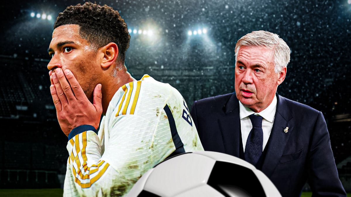Jude Bellingham looking down/sad next to Carlo Ancelotti, the Real Madrid logo behind them