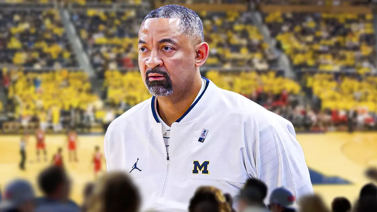 Michigan basketball, Wolverines, Juwan Howard, Jon Sanderson, Phil Martelli, Juwan Howard with Michigan basketball arena in the background