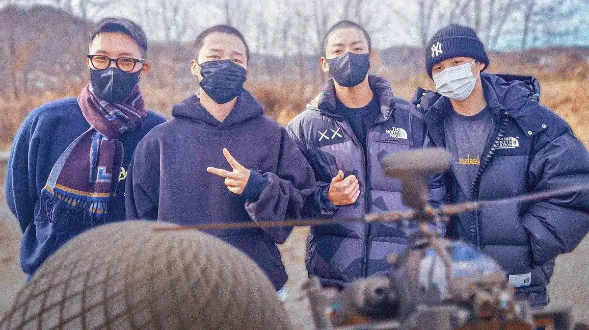 Pic of the four members of BTS reporting for military service
