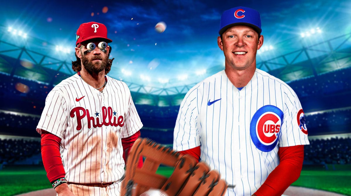 Rhys Hoskins in a Cubs uniform. Phillies' Bryce Harper in background with eyes popping out looking at Hoskins.