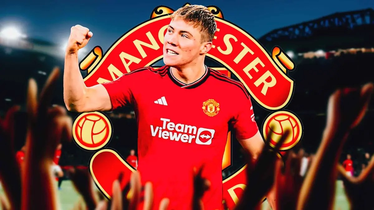 Rasmus Hojlund celebrating in front of the Manchester United logo