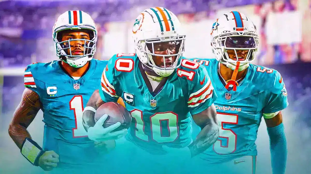 Miami Dolphins stars Tua Tagovailoa, Tyreek Hill, and Baltimore Ravens in front of M&T Bank Stadium.
