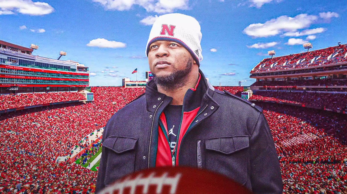 Ndamukong Suh with Nebraska football stadium in the background.
