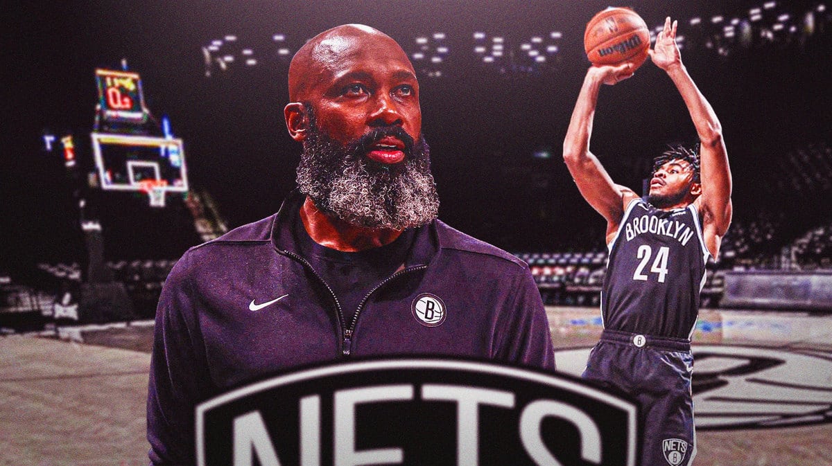 Nets' Jacque Vaughn in front. Nets' Cam Thomas shooting a basketball in background.