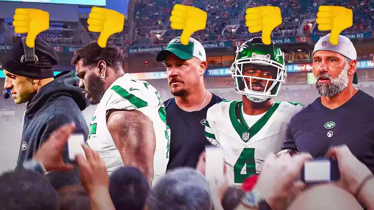 thumb: Robert Saleh, D.J. Reed, Mekhi Becton, Jeff Ulbrich, Nathaniel Hackett walking off field at Hard Rock Stadium with big thumbs down above their heads.