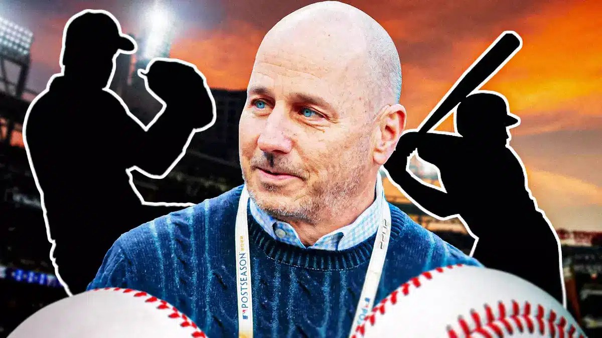 Brian Cashman with silhouette baseball players around him