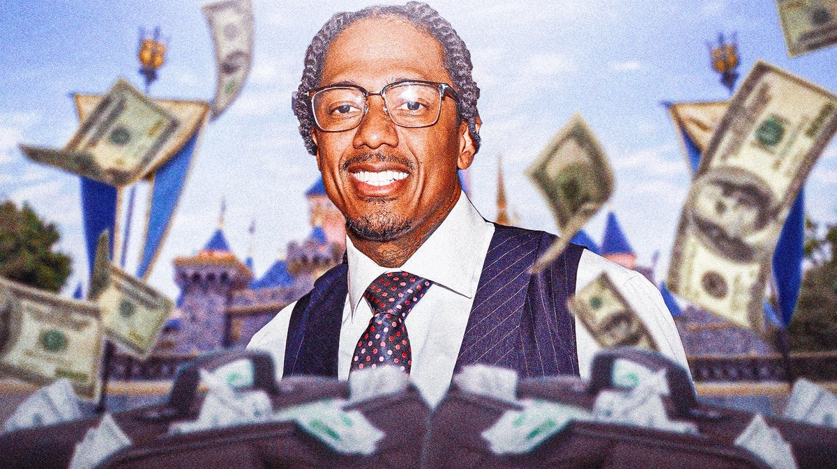 Nick Cannon with Disneyland behind him