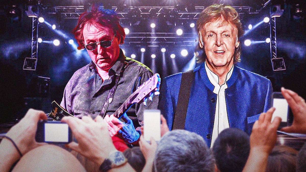 Wings guitarist Denny Laine and Paul McCartney with stage background.