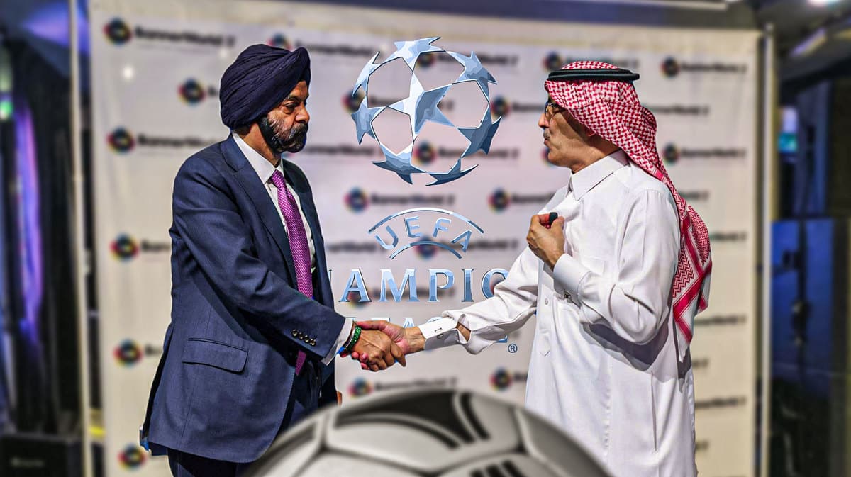 Saudi investors in front of the Champions League logo