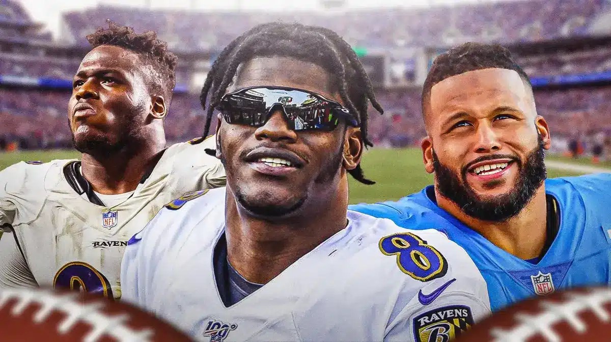 Lamar Jackson in between Justin Madubuike and Aaron Donald