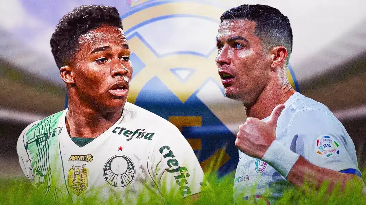 Endrick looking towards Cristiano Ronaldo, the Real Madrid logo behind them