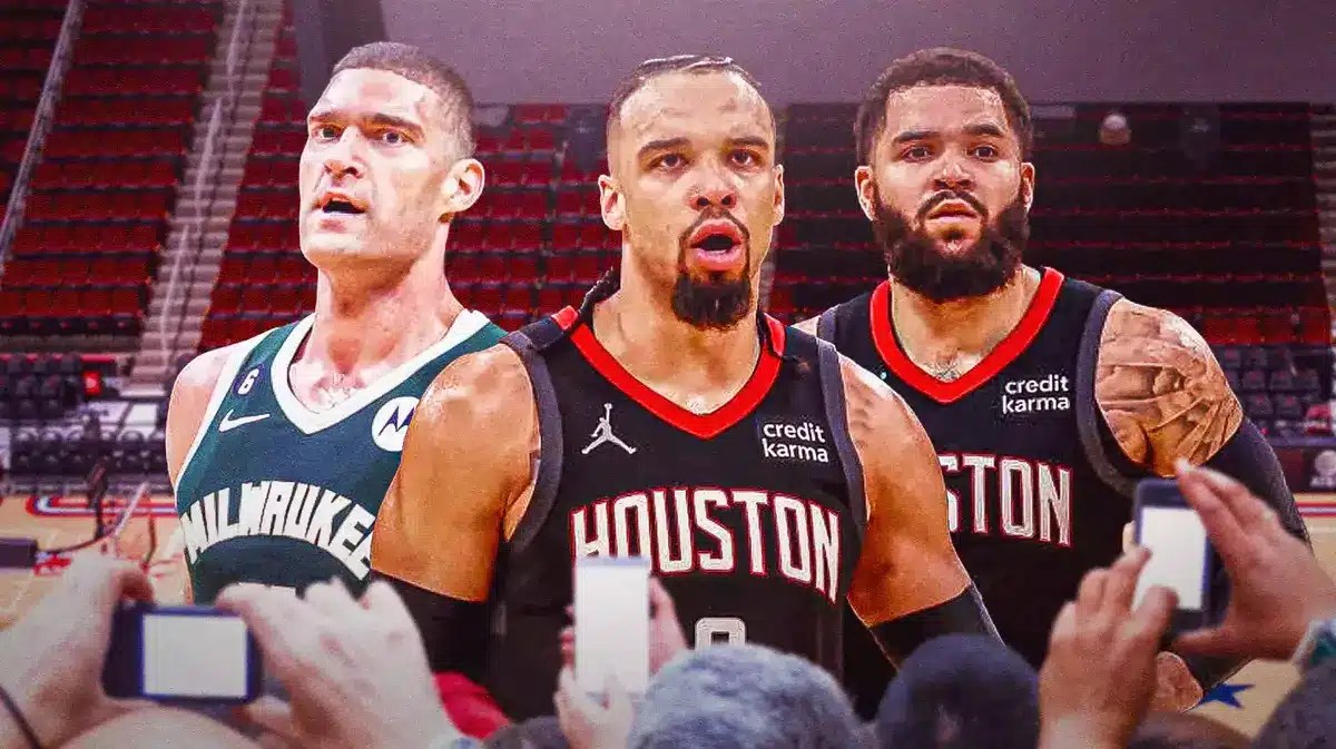 Dillon Brooks and Fred VanVleet next to Brook Lopez
