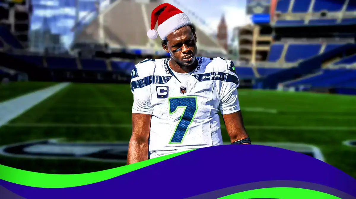 ACTION SHOT of Geno Smith (Seahawks) with a santa hat on him