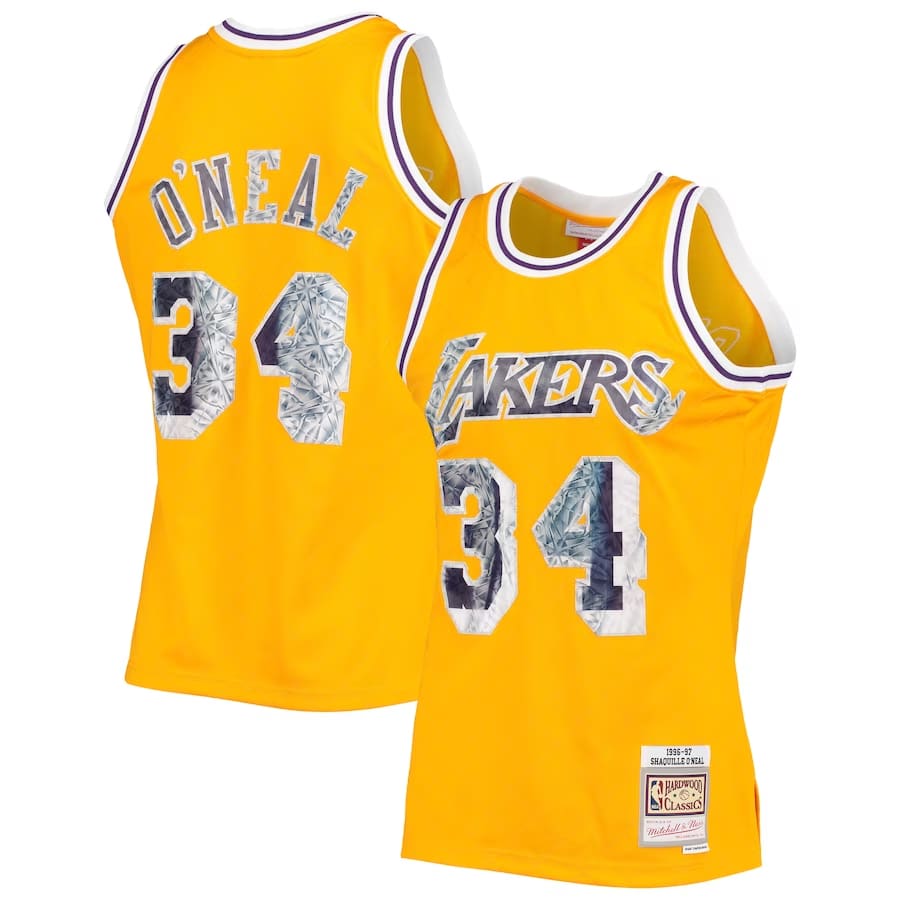 Shaquille O'Neal Los Angeles Lakers Mitchell & Ness 1996-97 Hardwood Classics NBA 75th Anniversary Diamond Swingman Jersey - Gold color on a white background.