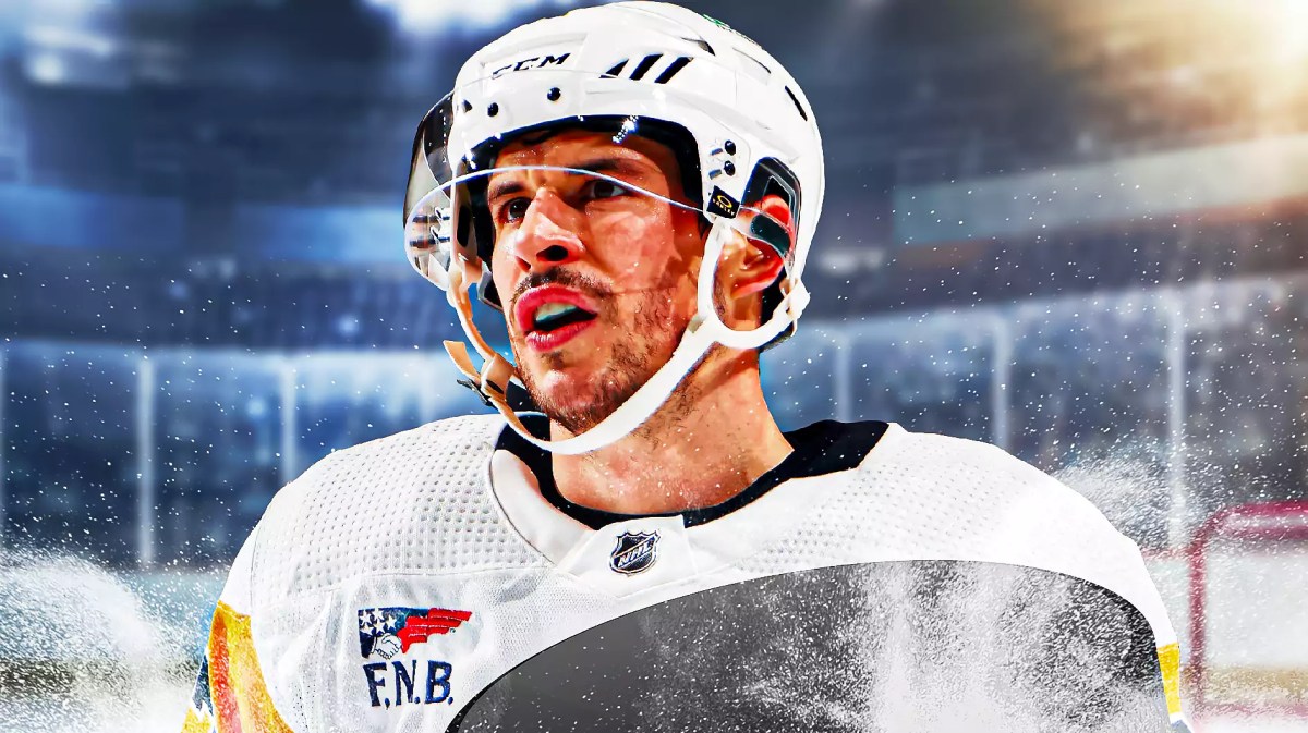 Penguins star Sidney Crosby in the foreground looking defeated.