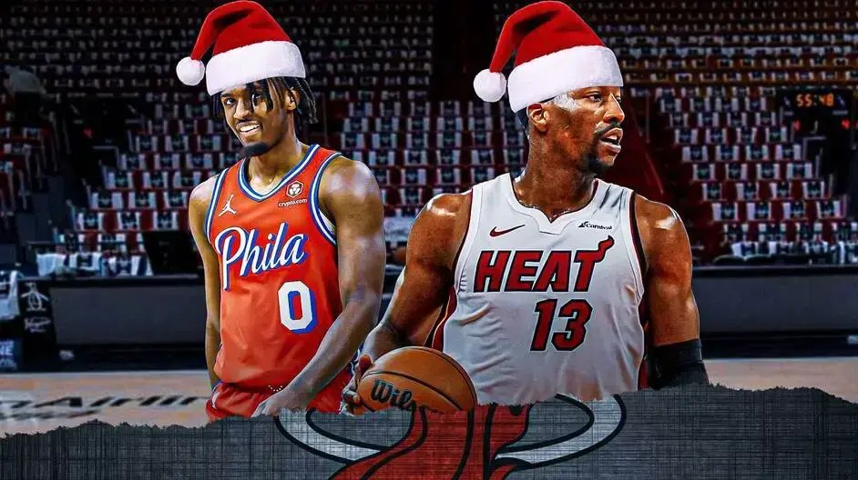 Sixers' Tyrese Maxey and Heat's Bam Adebayo in Santa hats
