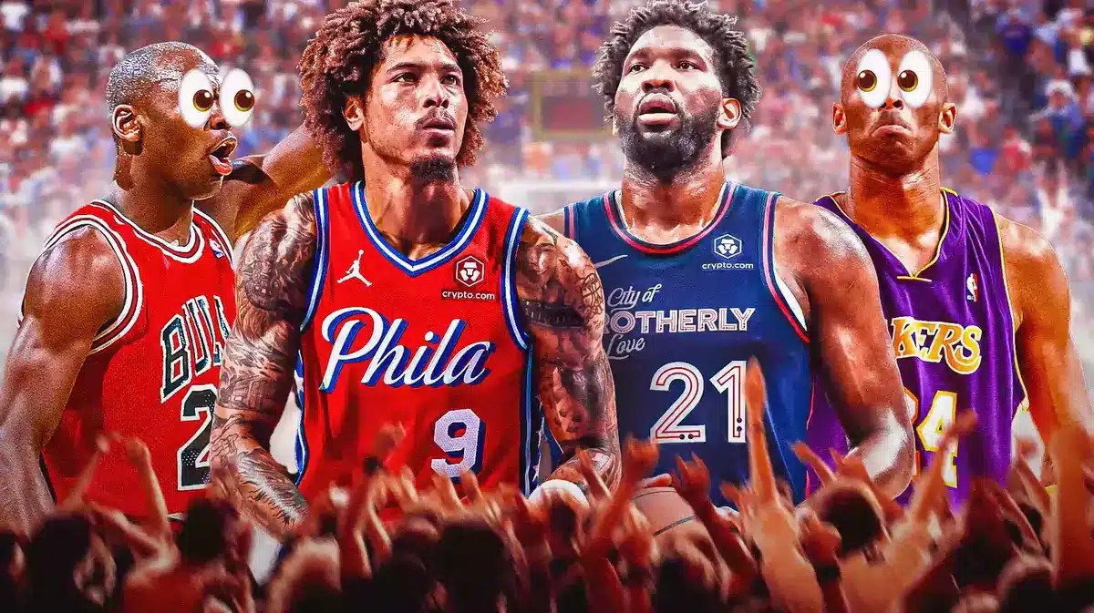 Sixers' Kelly Oubre Jr and Joel Embiid standing in between Michael Jordan and Kobe Bryant with eyeball emojis covering their eyes