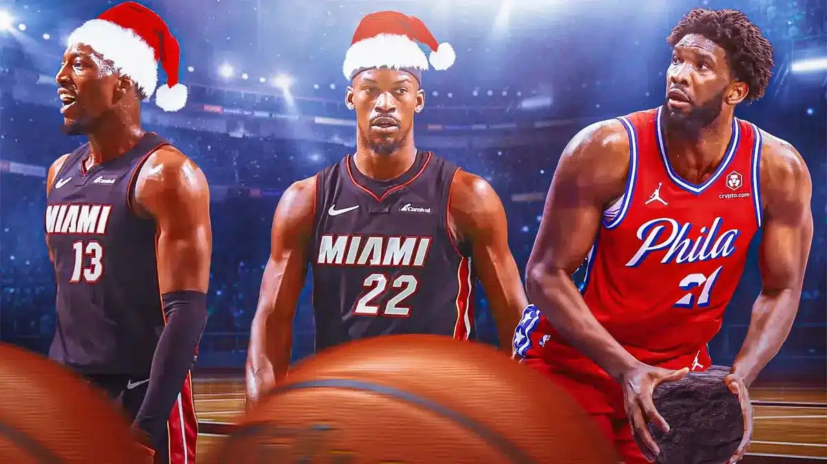 Joel Embiid with coal alongside Jimmy Butler and Bam Adebayo