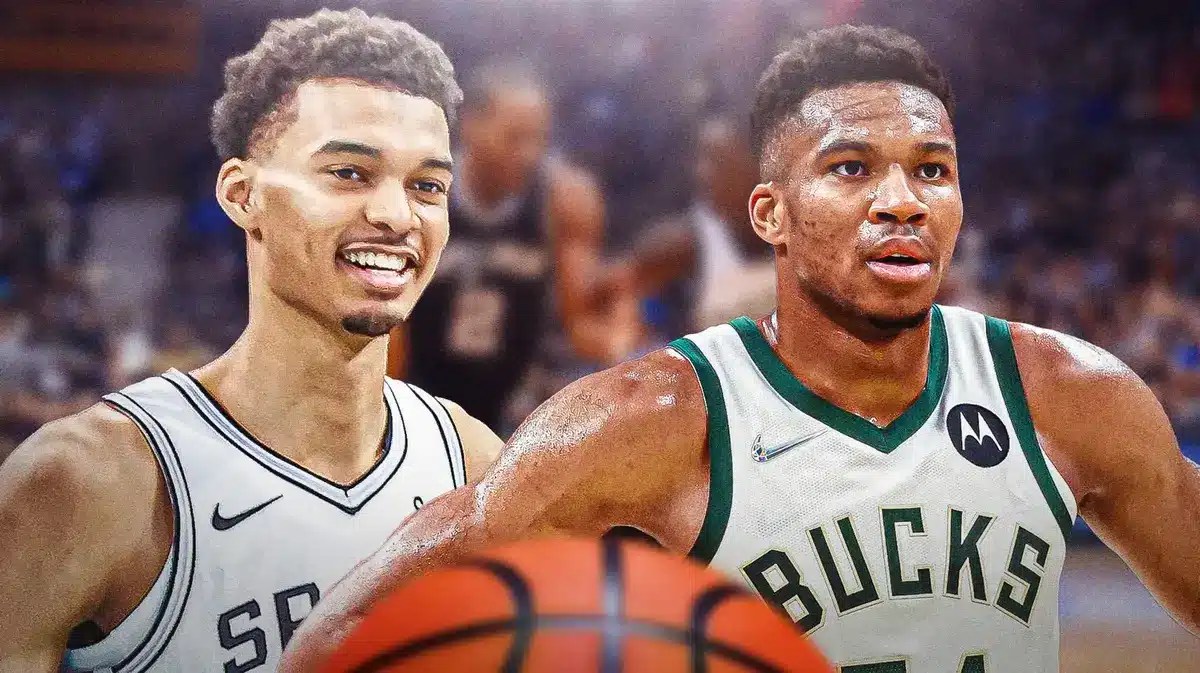 Photo: Victor Wembanyama in Spurs jersey smiling at Giannis Antetokounmpo in Bucks jersey