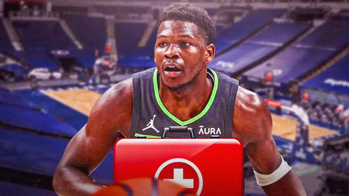 Photo: Anthony Edwards in Timberwolves jersey in action with medical kit beside him