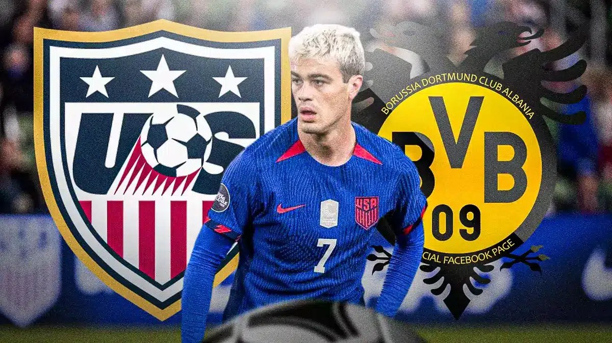 Gio Reyna in front of the USMNT and Borussia Dortmund logos
