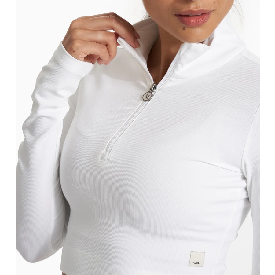 Vuori Lux Rib Half Zip - White colored on a model on a light gray background.