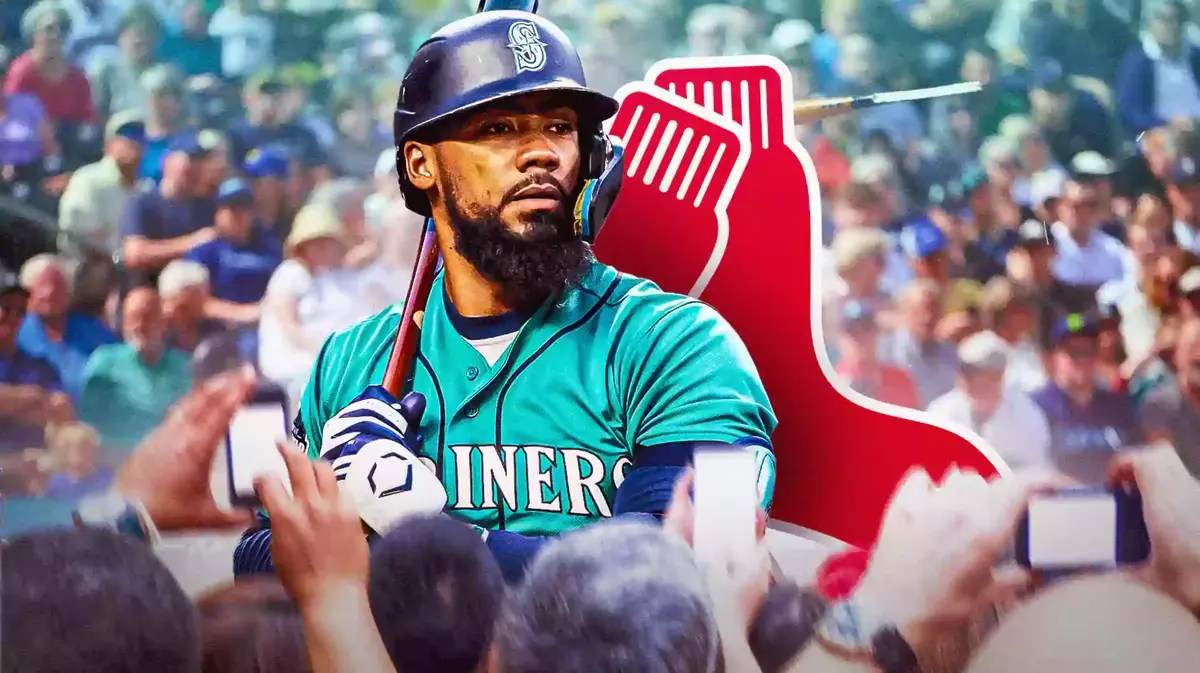 Seattle Mariners outfield Teoscar Hernandez with Boston Red Sox Logo at the back