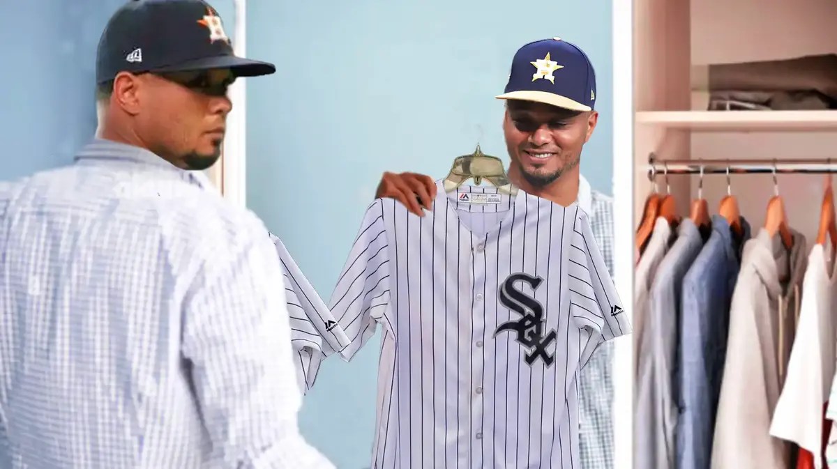 Martin Maldonado trying on a White Sox uniform