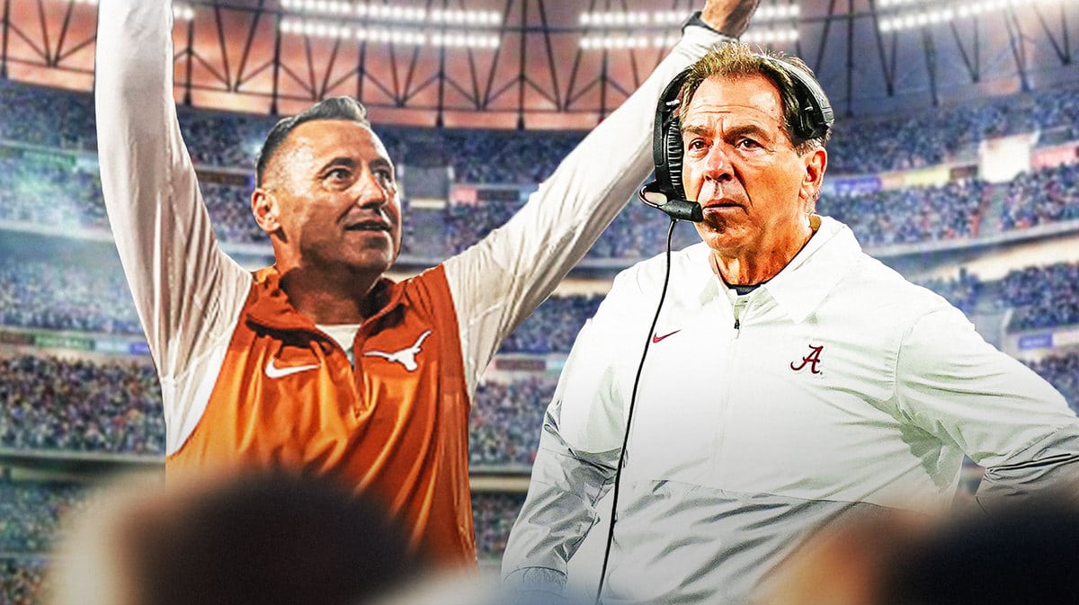 Steve Sarkisian celebrating over Nick Saban