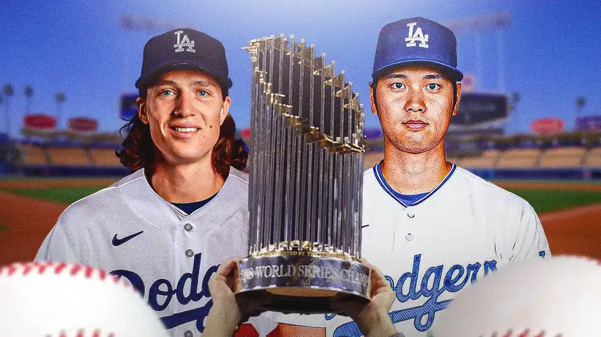 Dodgers' Tyler Glasnow, Dodgers’ Shohei Ohtani holding the MLB World Series trophy at Dodger Stadium.