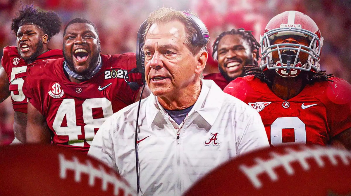 Alabama football players and Coach Nick Saban looking excited.