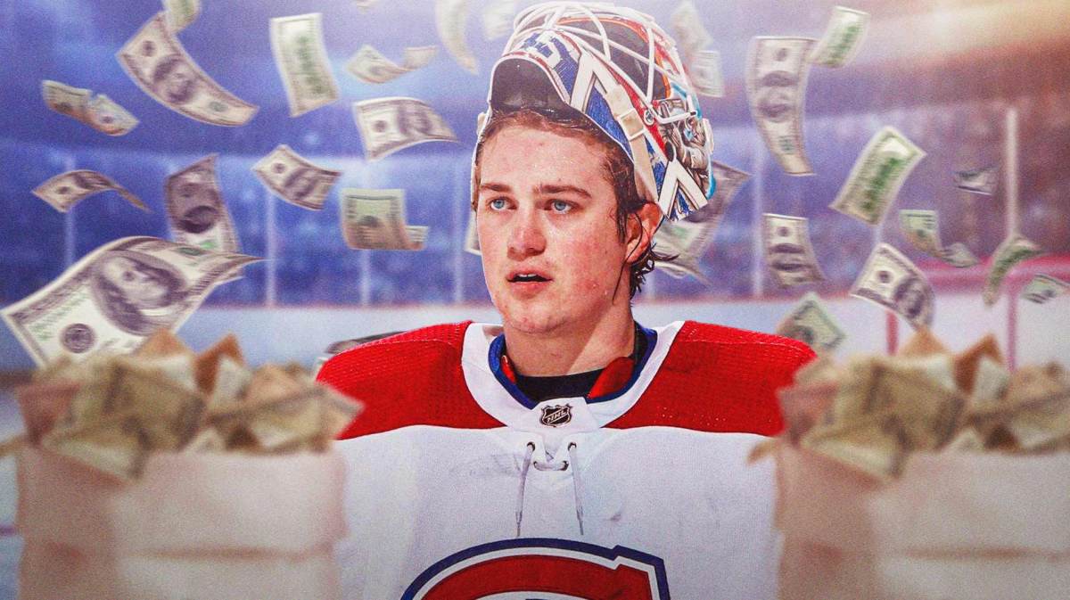 Sam Montembeault with money around him