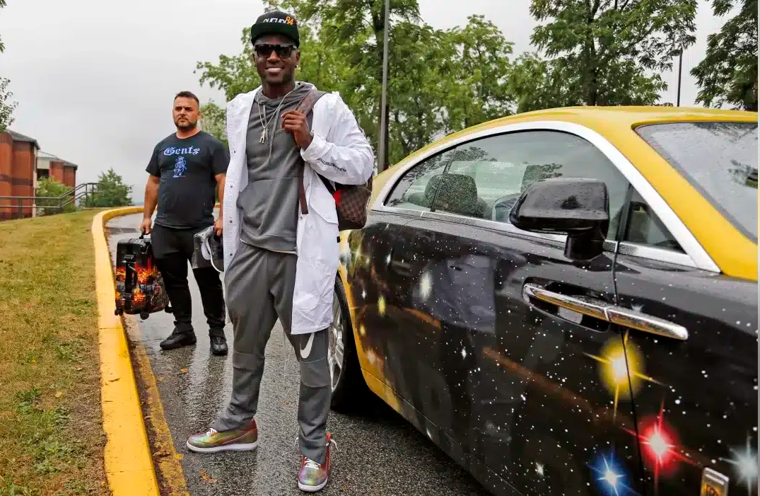 Antonio Brown next to his custom-painted Rolls-Royce.